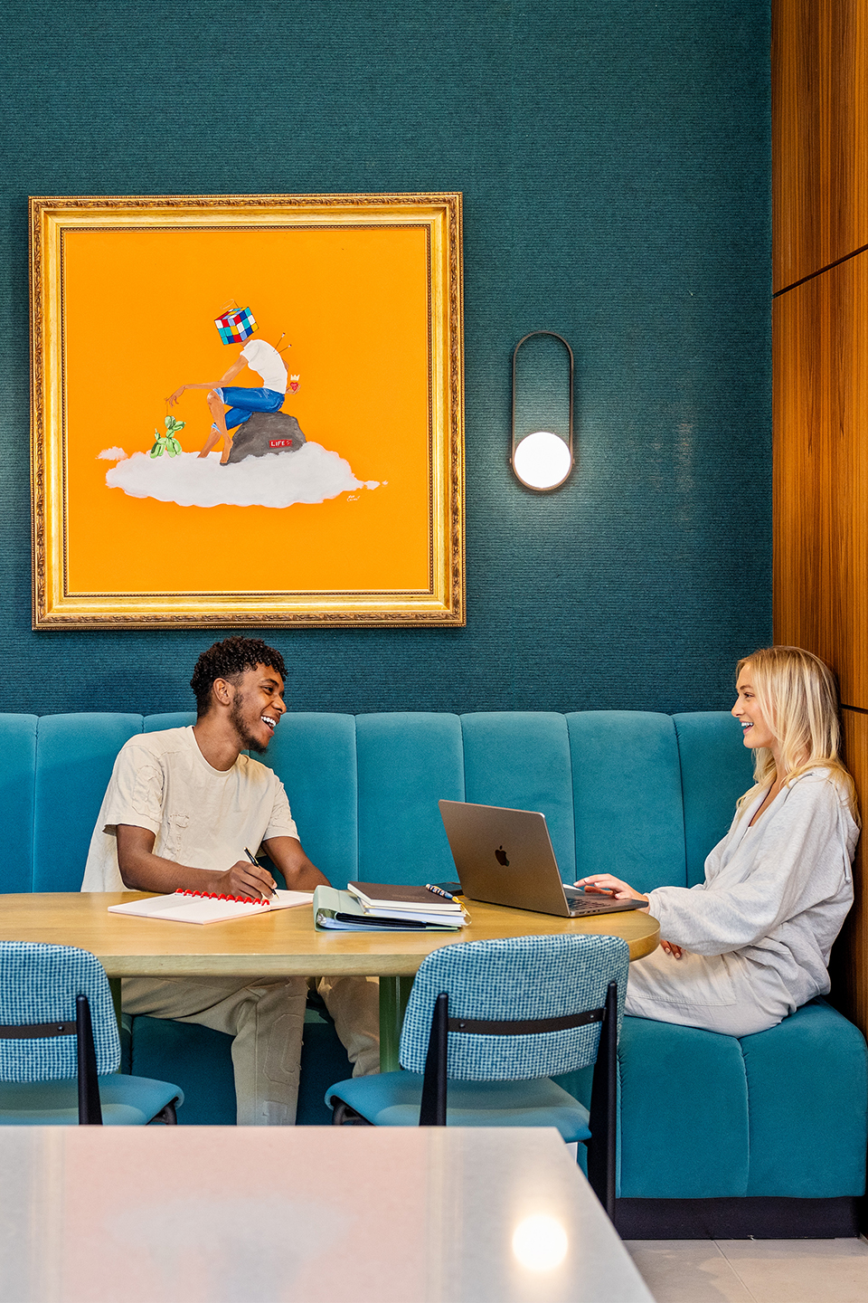 Two friends studying together