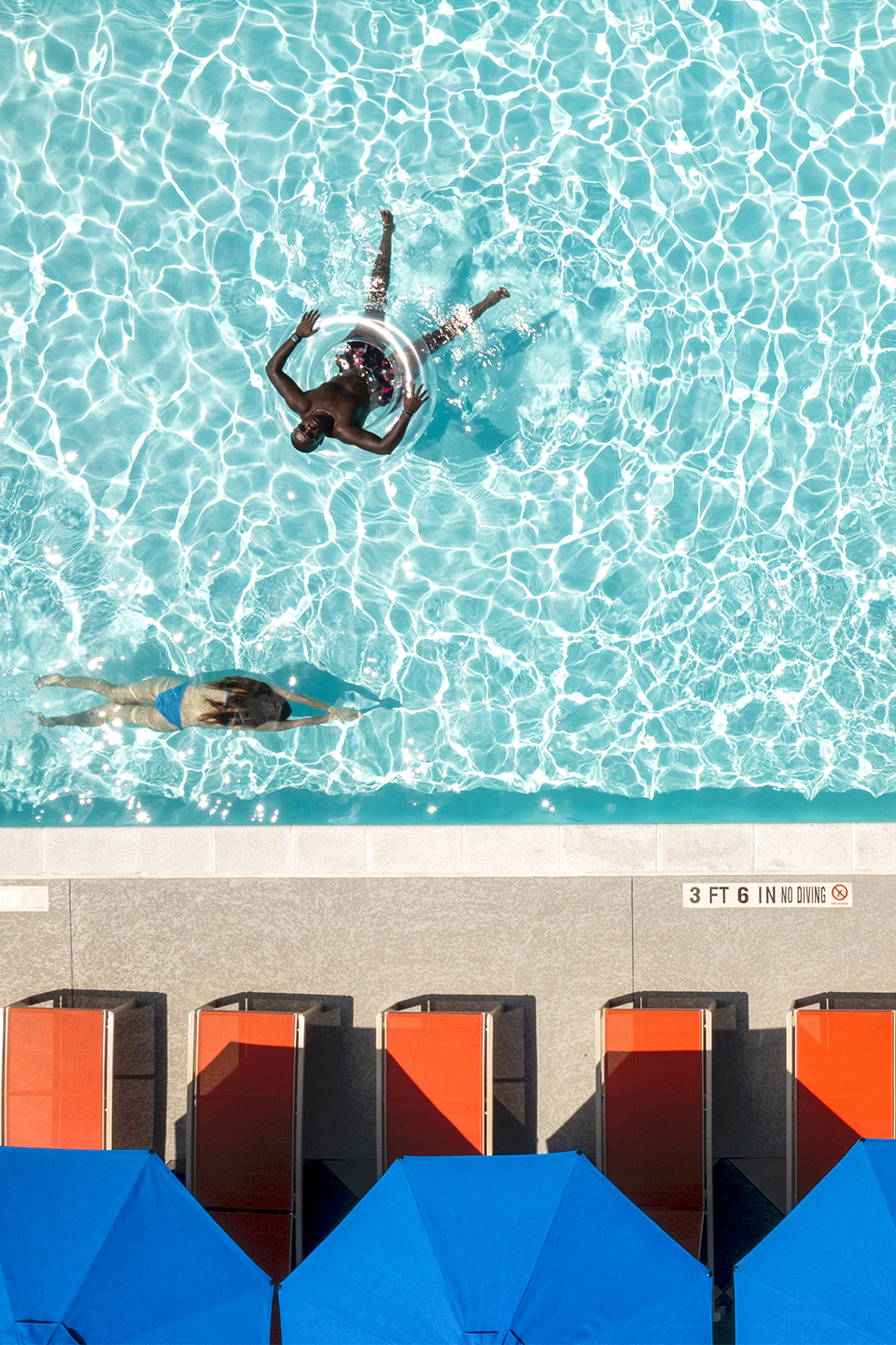 People swimming in a pool